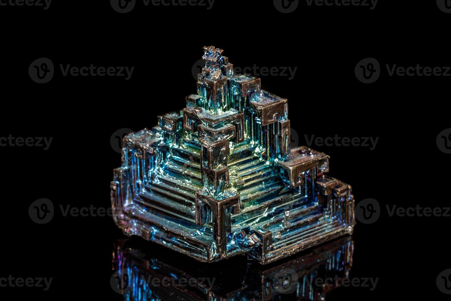 Macro of the stone bismuth mineral on a black background photo