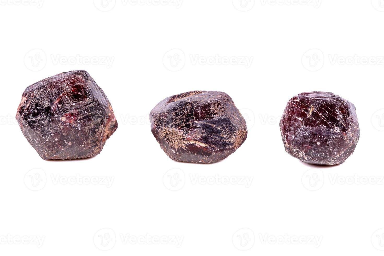 Macro of a mineral garnet stone on a white background photo