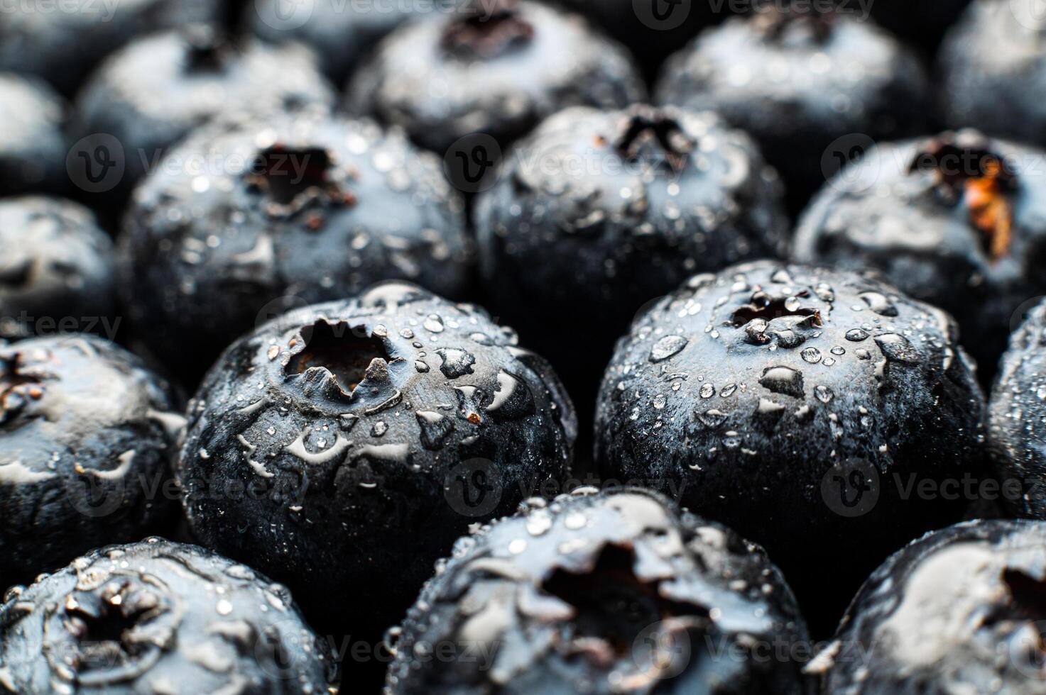 Ripe sweet blueberries. Fresh blueberries background. Vegan and vegetarian concept. Macrotexture of blueberries. Texture of blueberries close-up photo