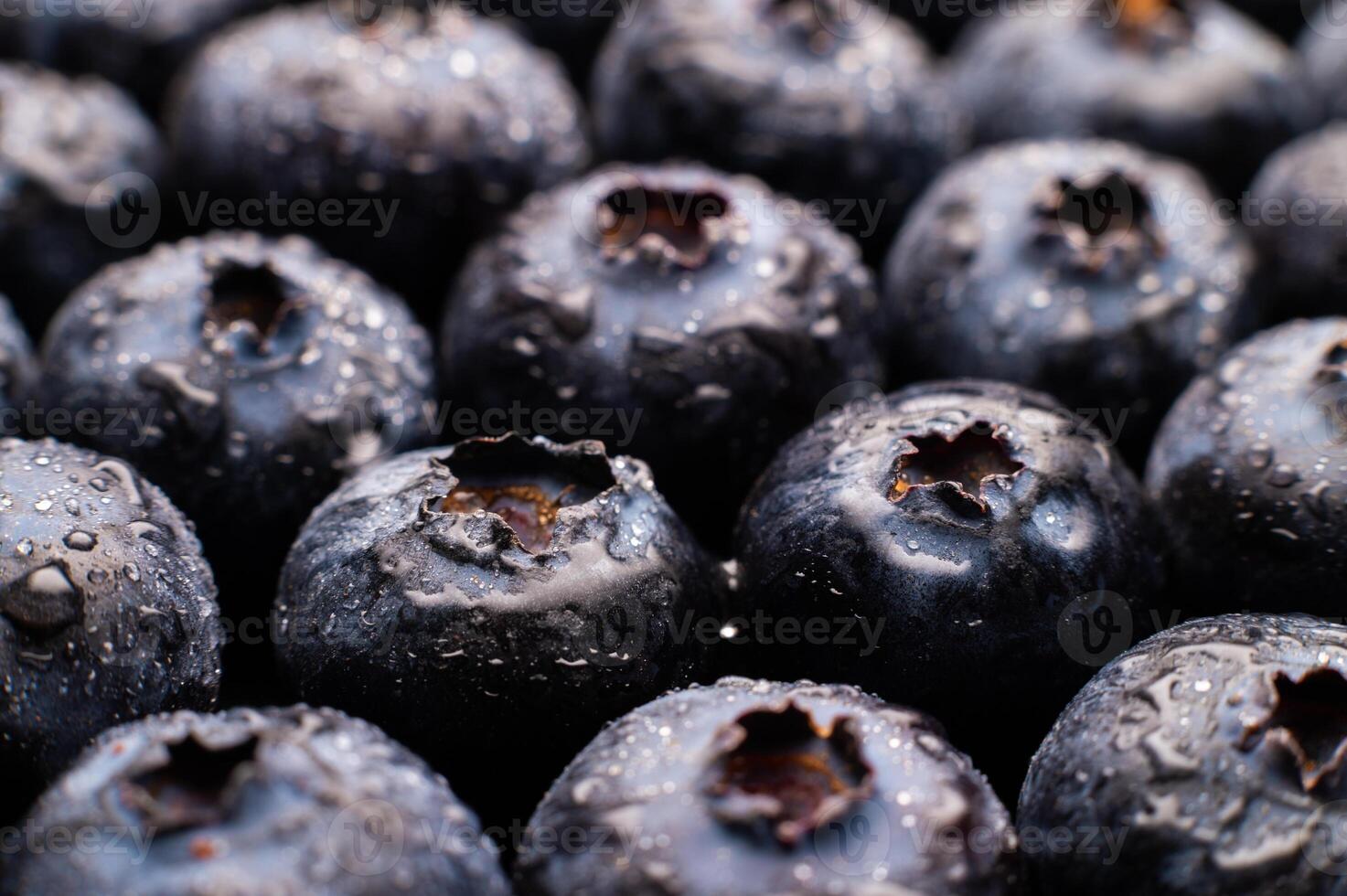 Ripe sweet blueberries. Fresh blueberries background. Vegan and vegetarian concept. Macrotexture of blueberries. Texture of blueberries close-up photo