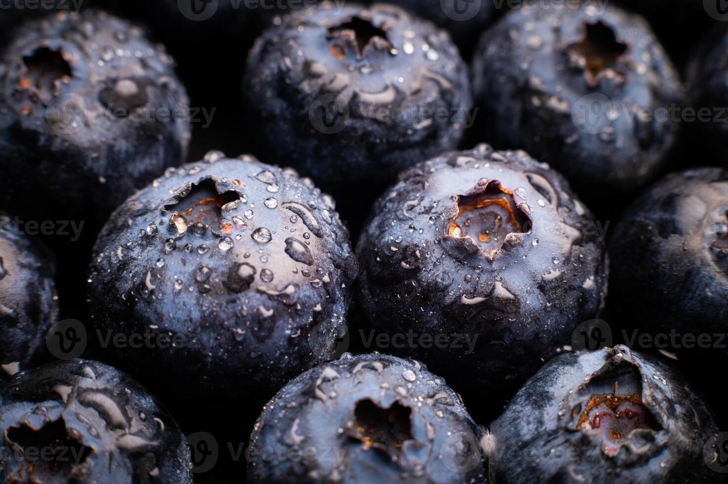 Ripe sweet blueberries. Fresh blueberries background. Vegan and vegetarian concept. Macrotexture of blueberries. Texture of blueberries close-up photo