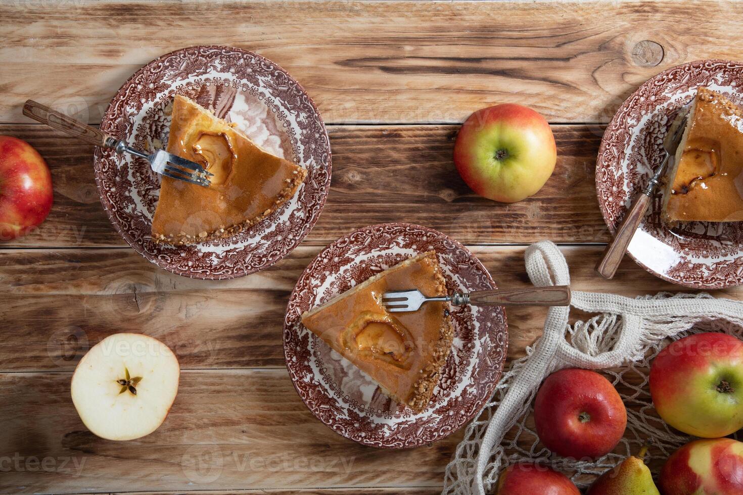 Thanksgiving Rustic wooden table setting with apple pie, home baking photo
