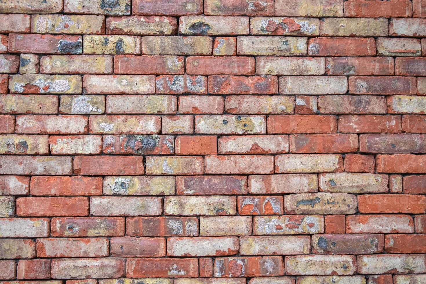 rough red stone brick wall texture background, abstract background photo