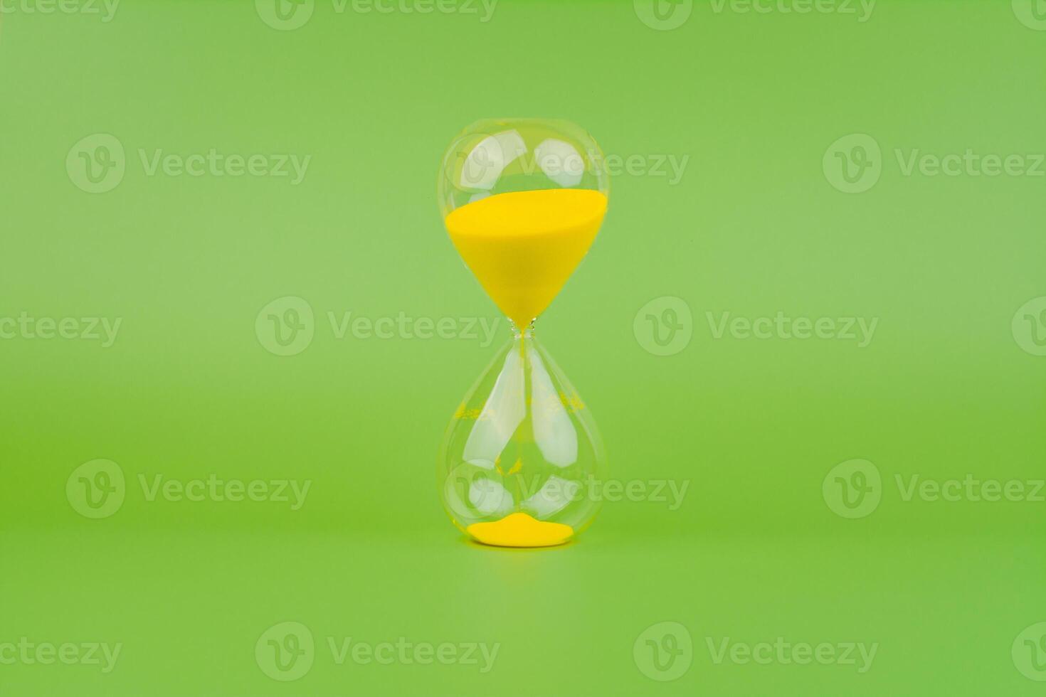 Hourglass, colorful countdown, time limit, time concept and importance of spending time. photo