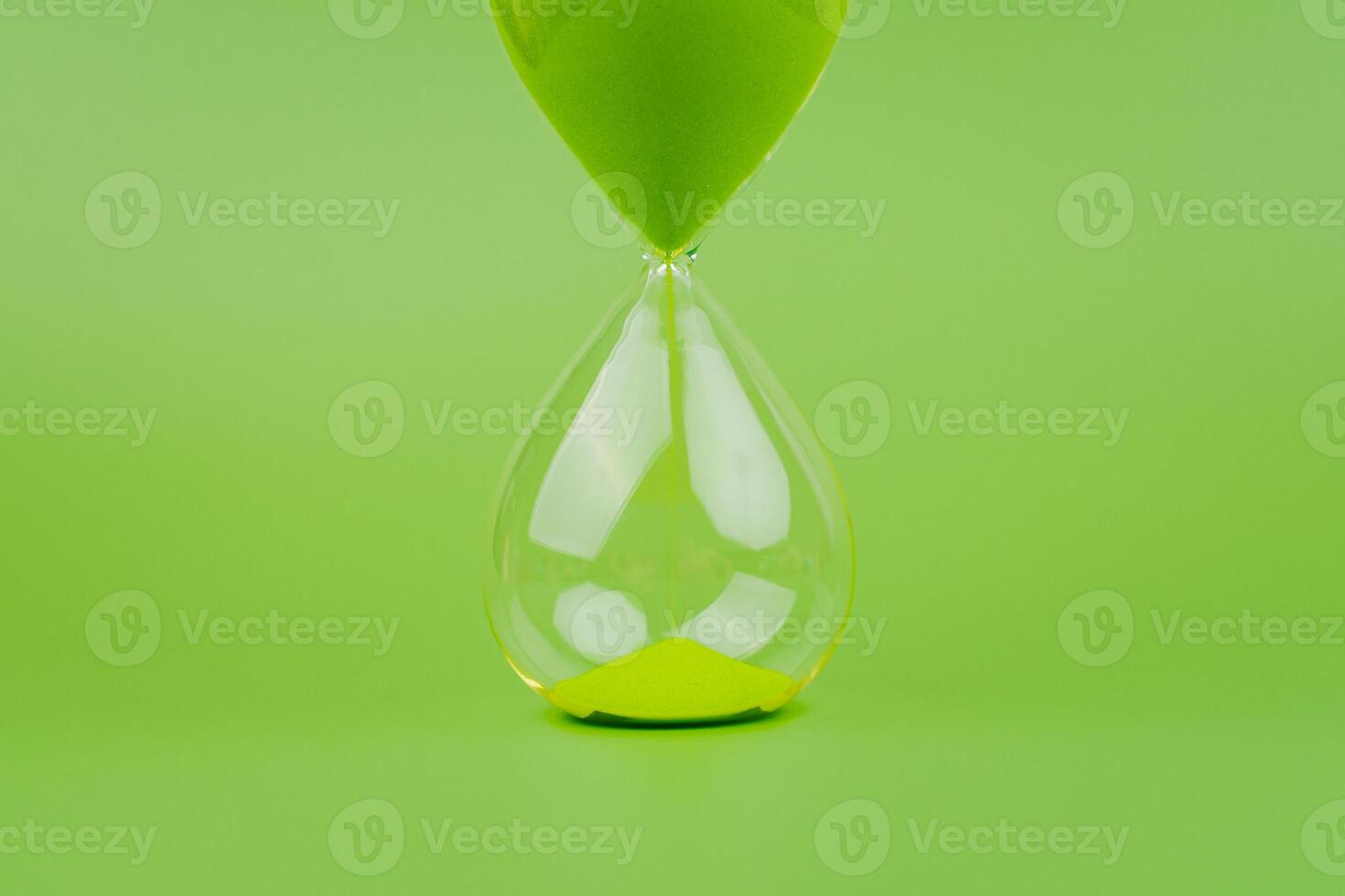 Hourglass, colorful countdown, time limit, time concept and importance of spending time. photo