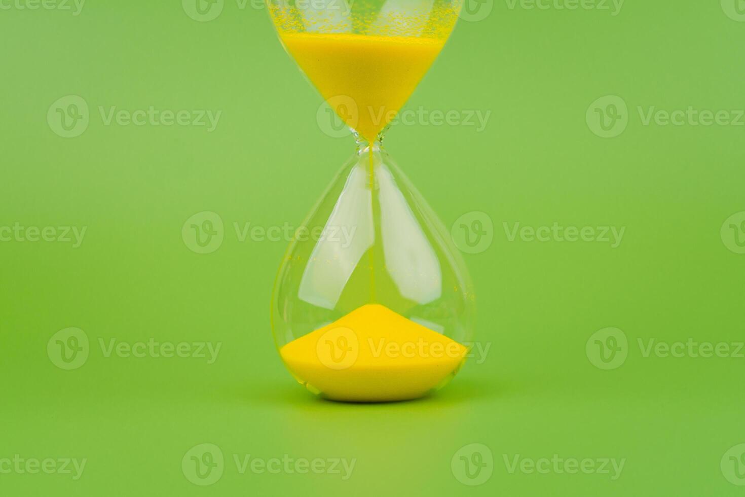 Hourglass, colorful countdown, time limit, time concept and importance of spending time. photo