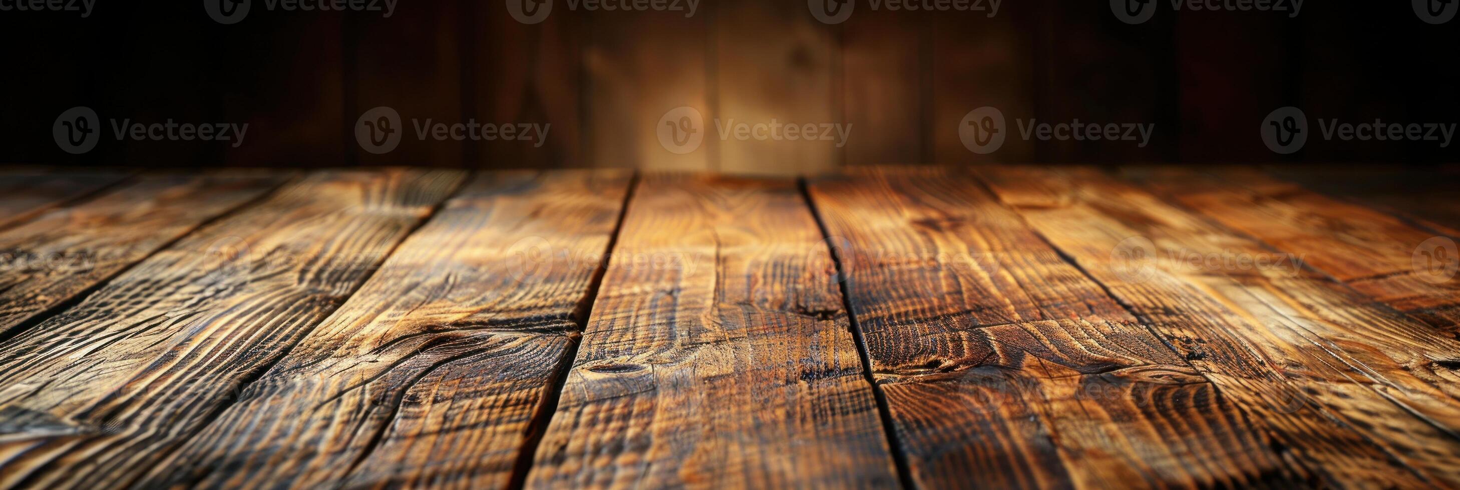 A wooden floor set against a dark background photo