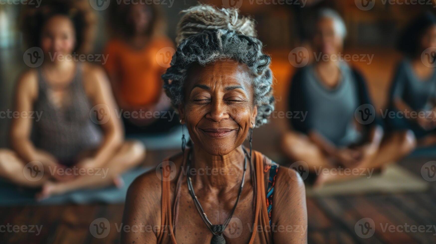 Elderly lady enjoying a relaxing yoga session with others photo