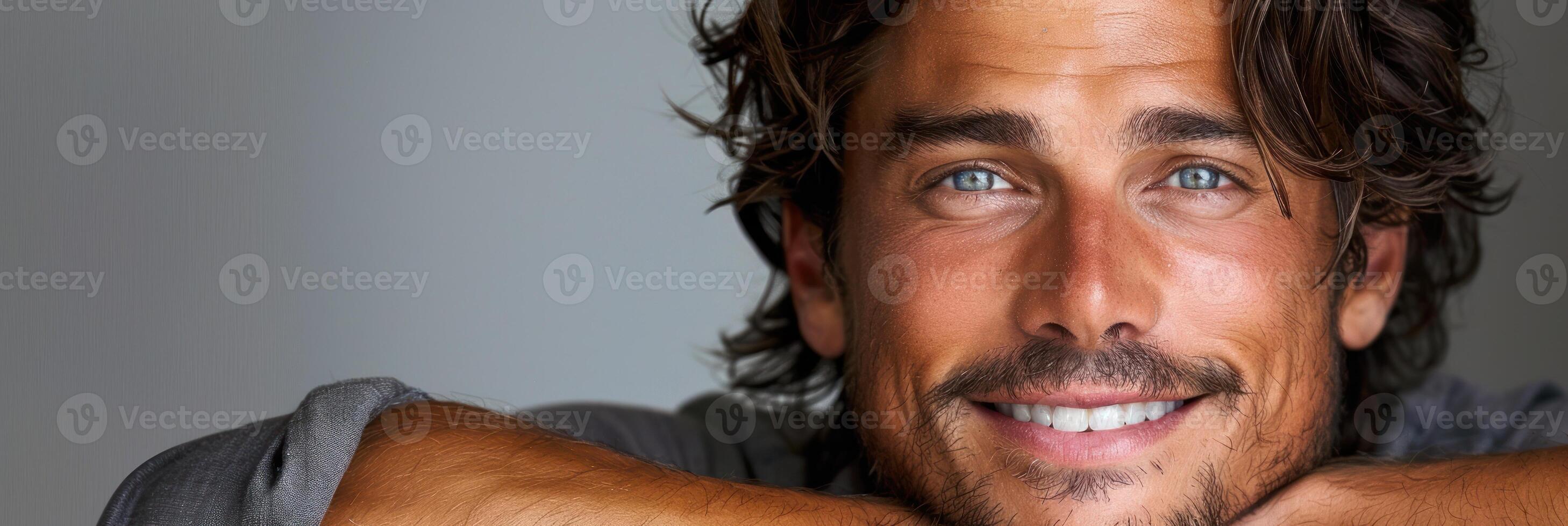 Close-up of a person with a smile on their face photo