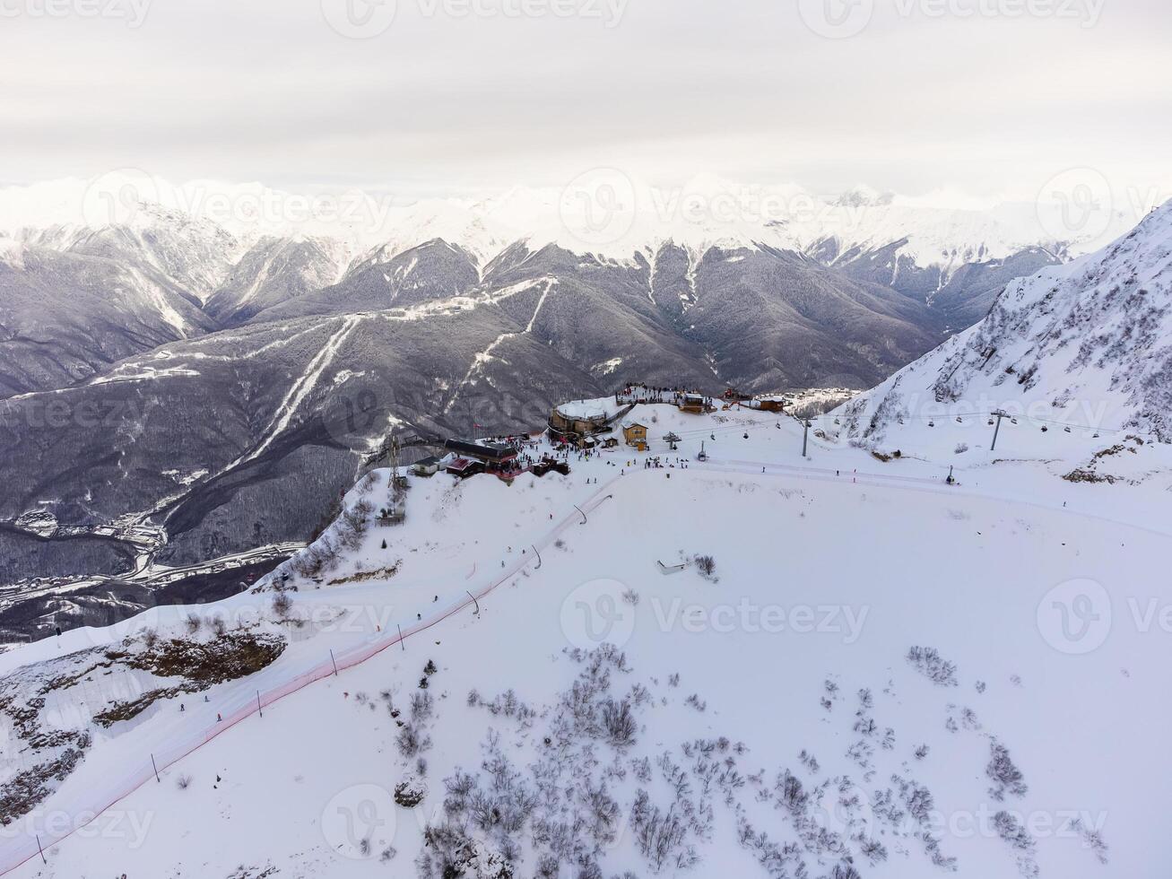 A view of the Krasnaya Polyana ski resort and the snowy mountain landscapes photo