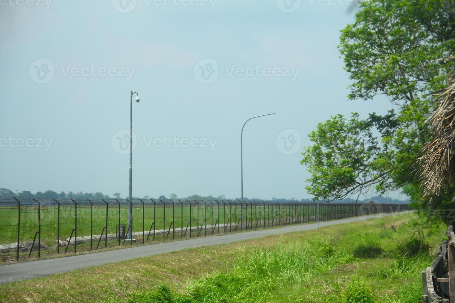 Street lights decorated with blue sky in sunny afternoon photo