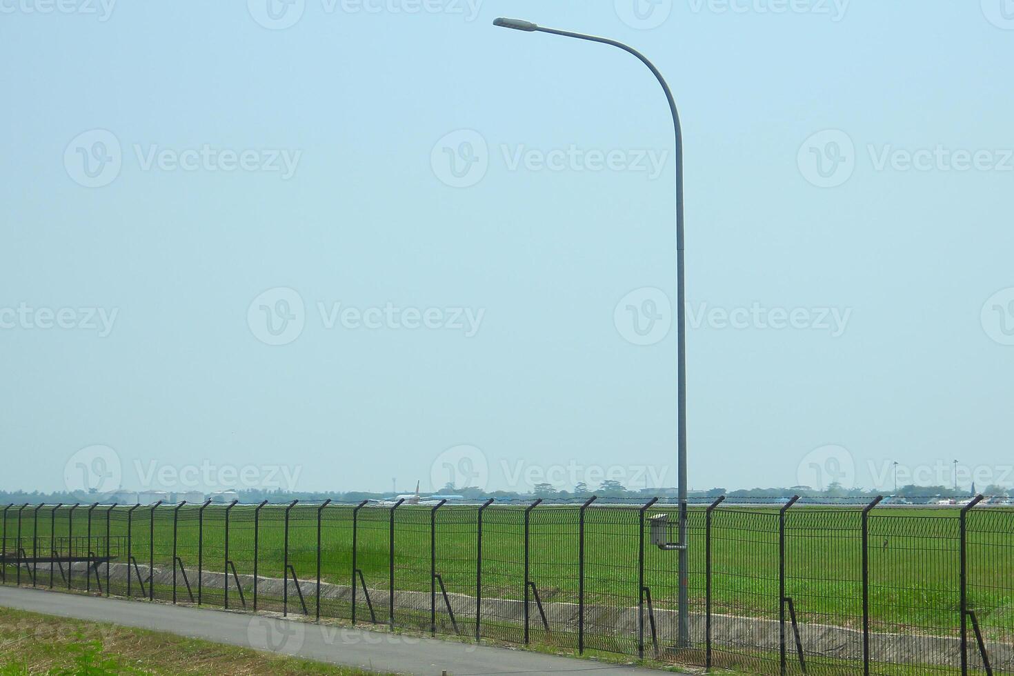 Street lights decorated with blue sky in sunny afternoon photo