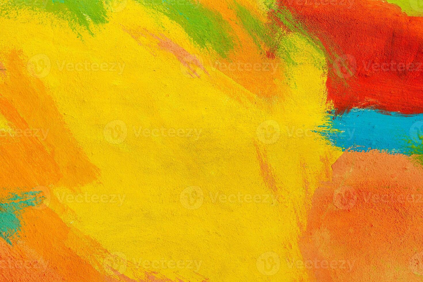 A fragment of colorful graffiti painted on a wall. Abstract urban background. Spray painting art. photo