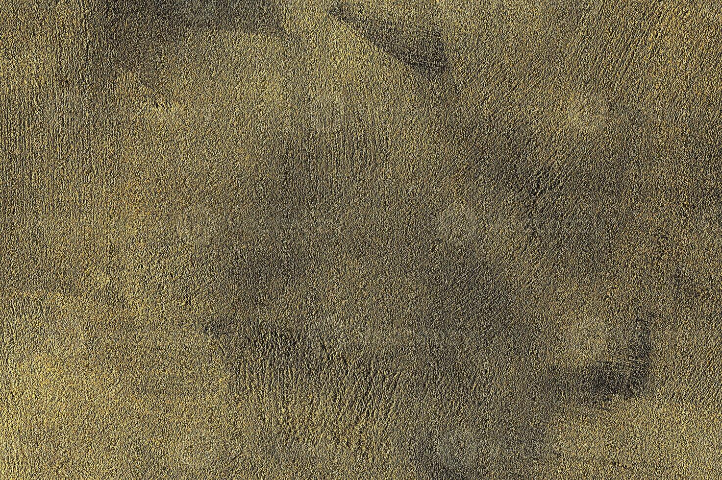 Texture of golden decorative plaster or concrete. Abstract gold grunge background. photo