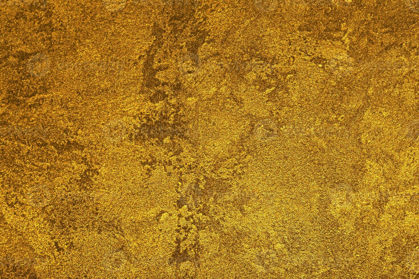 Texture of golden decorative plaster or concrete. Abstract gold grunge background. photo