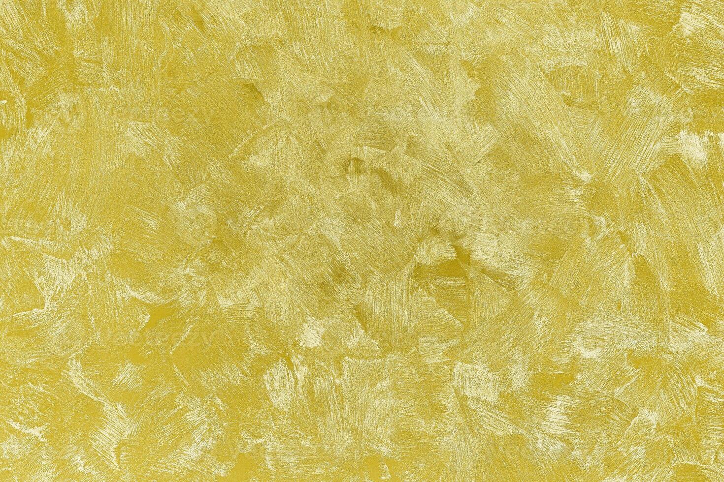 Texture of golden decorative plaster or concrete. Abstract gold grunge background. photo