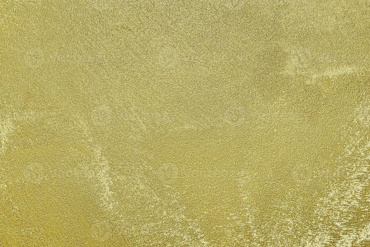 Texture of golden decorative plaster or concrete. Abstract gold grunge background. photo