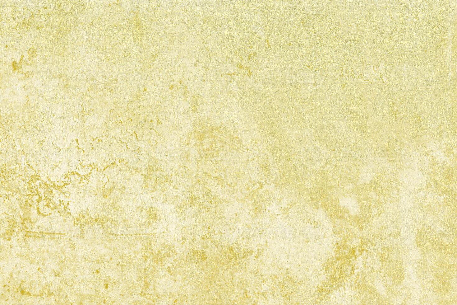 Texture of golden decorative plaster or concrete. Abstract gold grunge background. photo