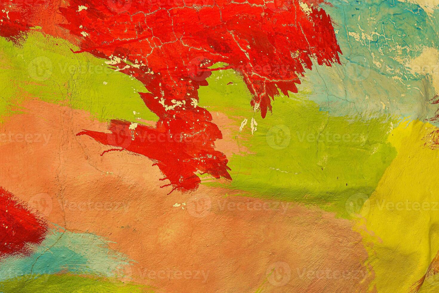 A fragment of colorful graffiti painted on a wall. Abstract urban background. Spray painting art. photo