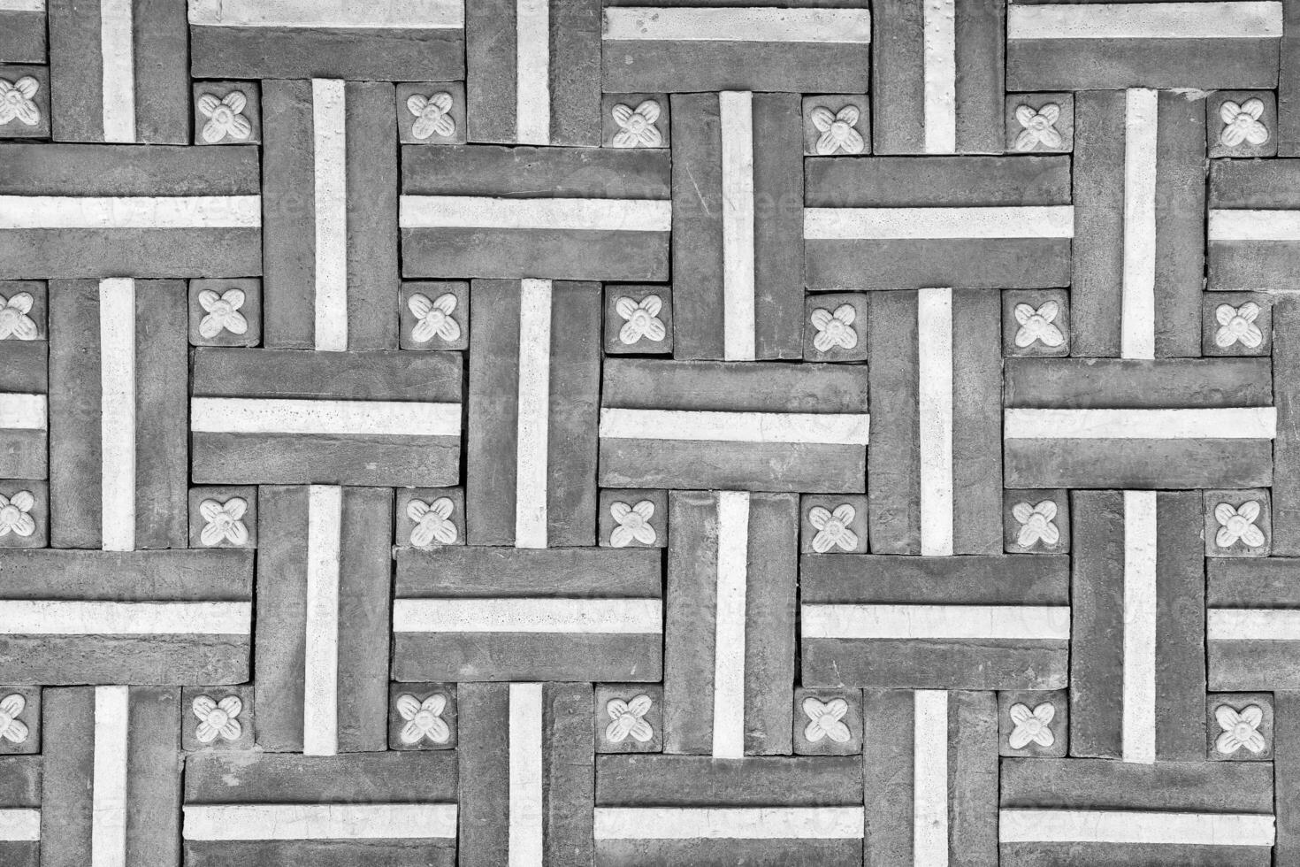 Black and white Texture of a decorative brick-like tiles. Abstract background for design. photo