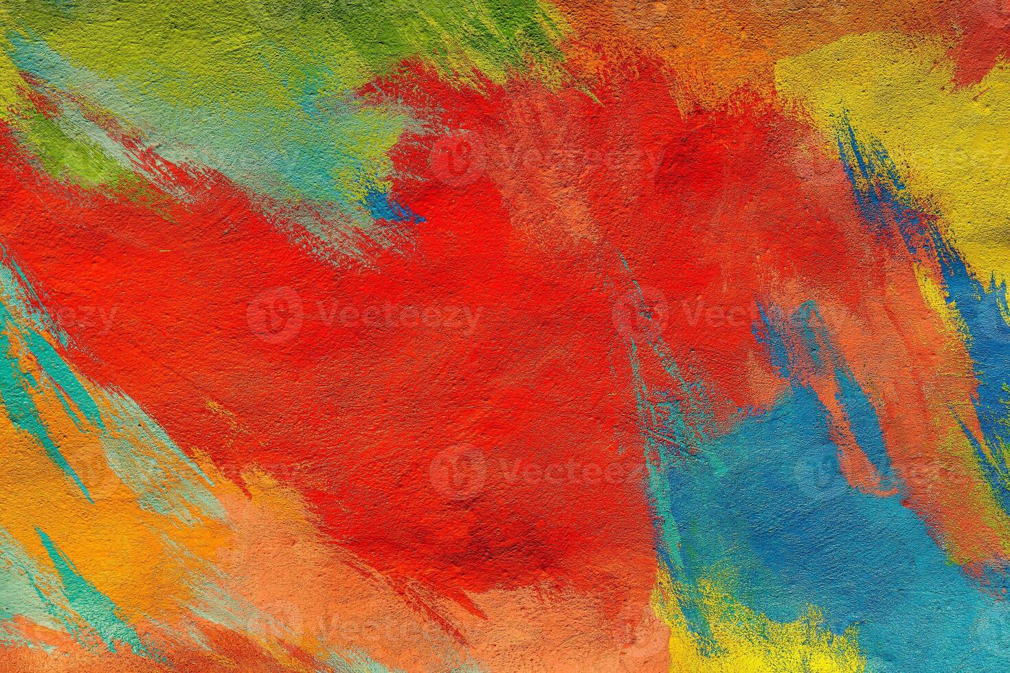 A fragment of colorful graffiti painted on a wall. Abstract urban background. Spray painting art. photo