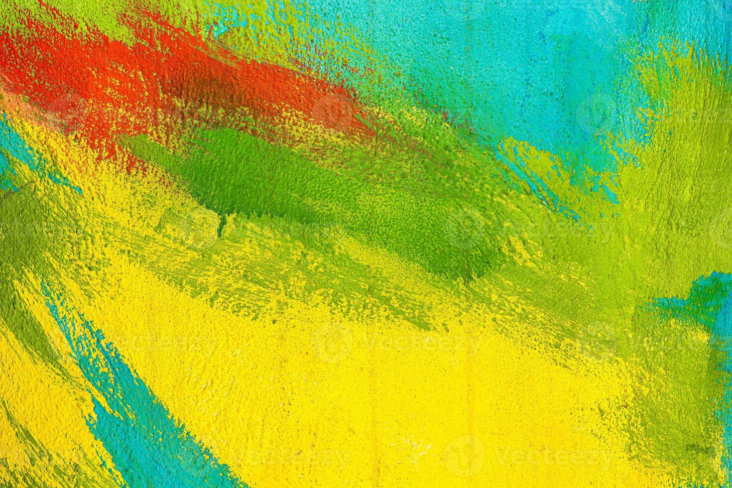 A fragment of colorful graffiti painted on a wall. Abstract urban background. Spray painting art. photo