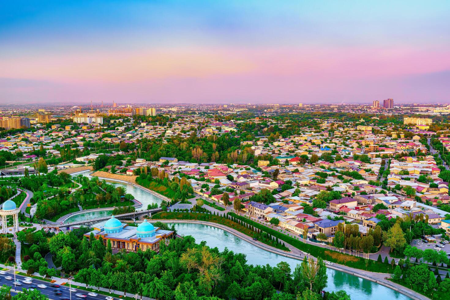 Uzbekistan, Tashkent - April 24, 2023 Top view from the observation deck on the Tashkent TV tower to the central part of the city during the twilight. photo