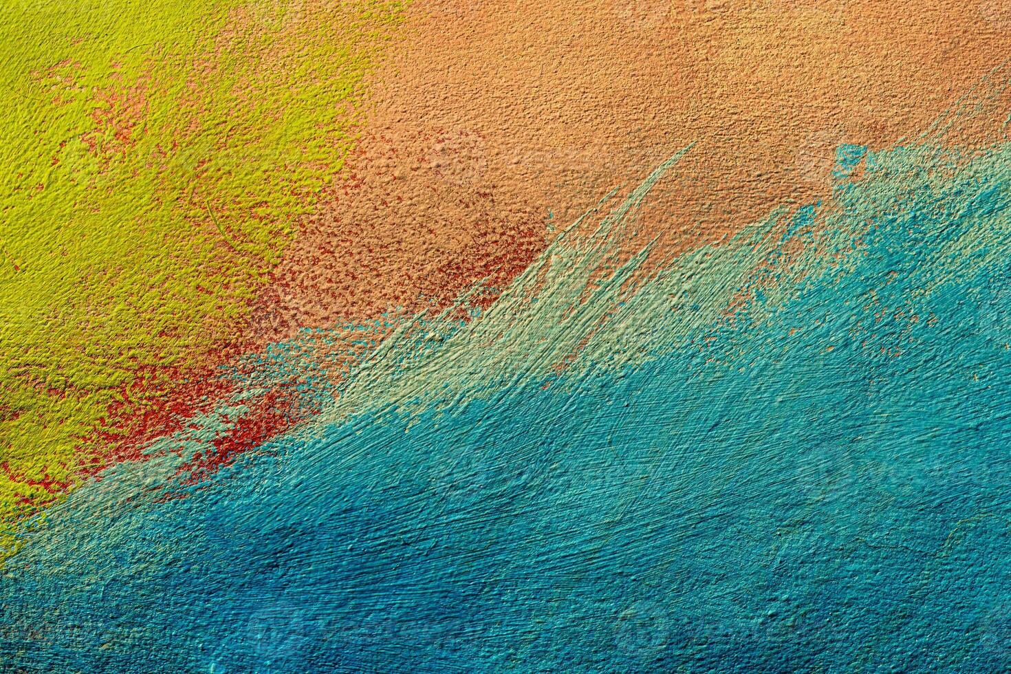A fragment of colorful graffiti painted on a wall. Abstract urban background. Spray painting art. photo