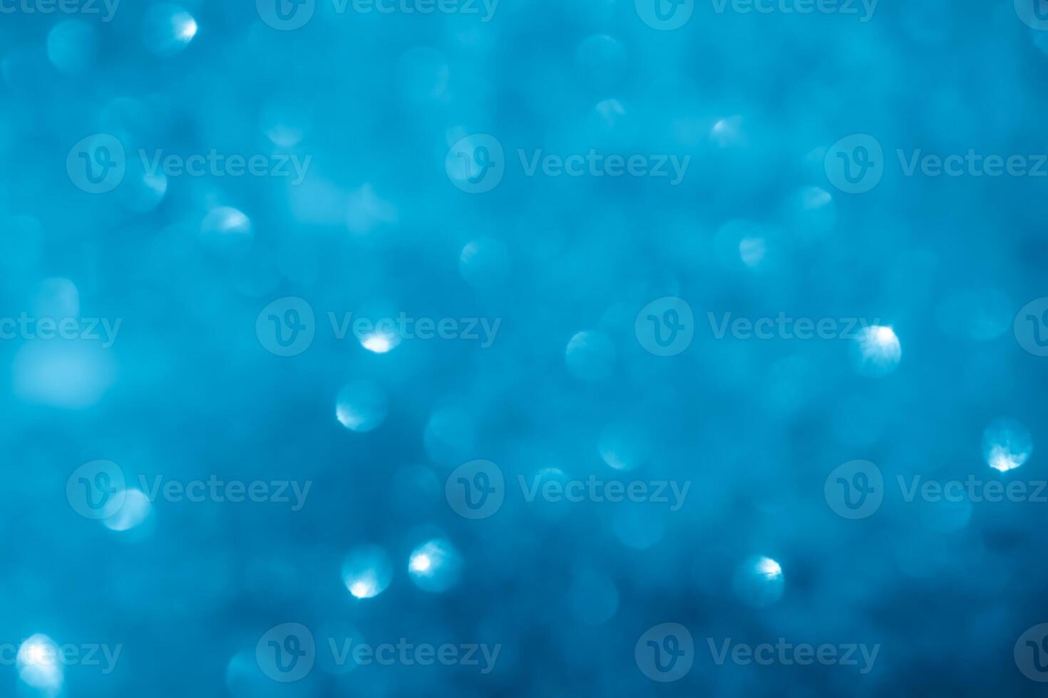 Turquoise lights bokeh background. Blue lights. photo