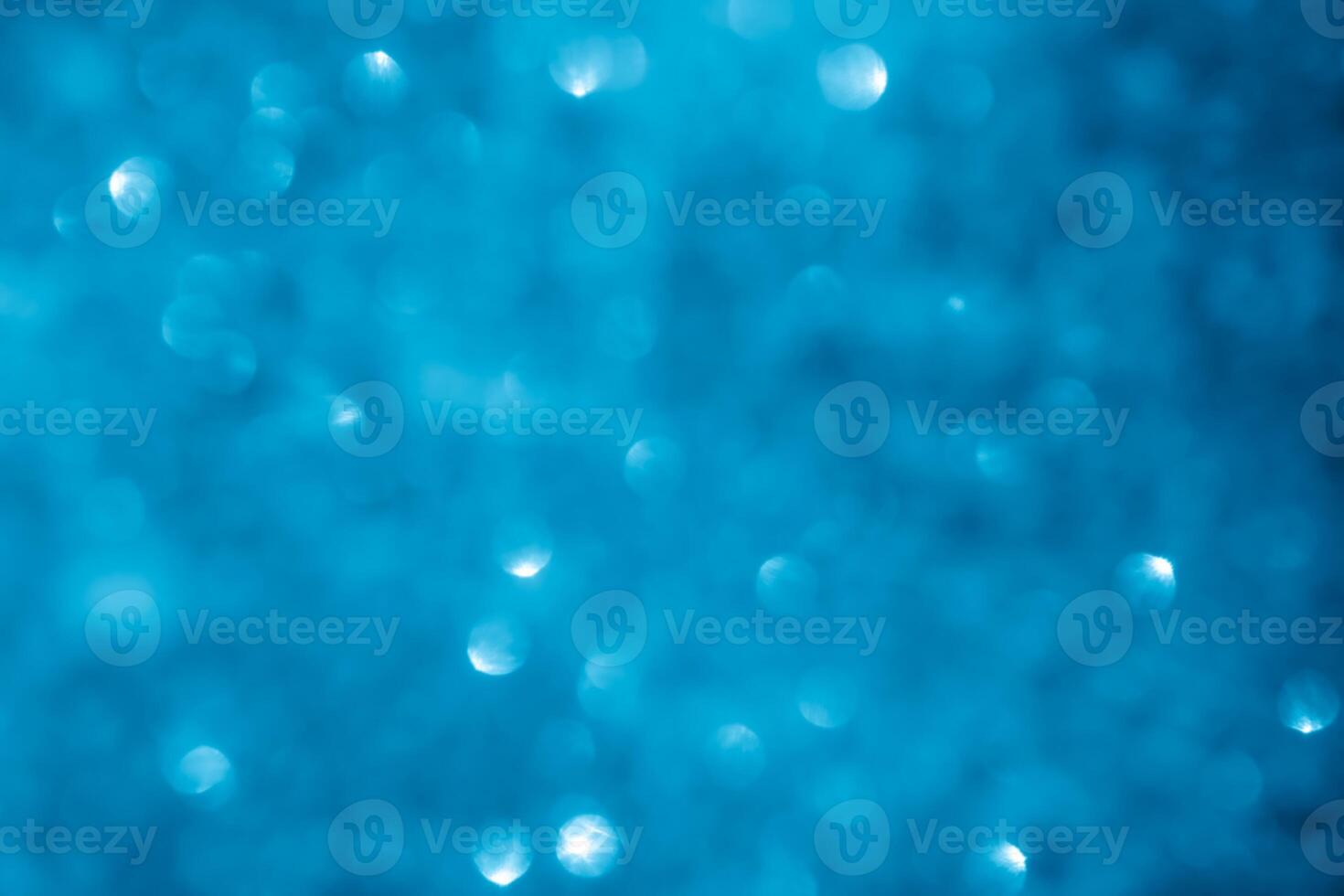 Turquoise lights bokeh background. Blue lights. photo