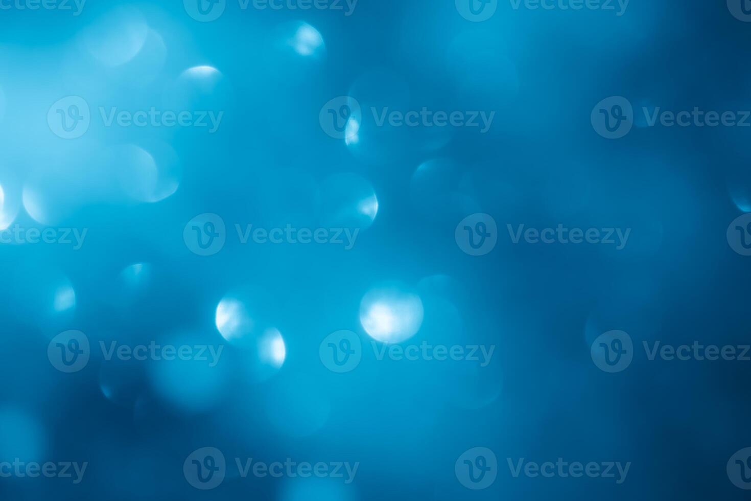 Turquoise lights bokeh background. Blue lights. photo