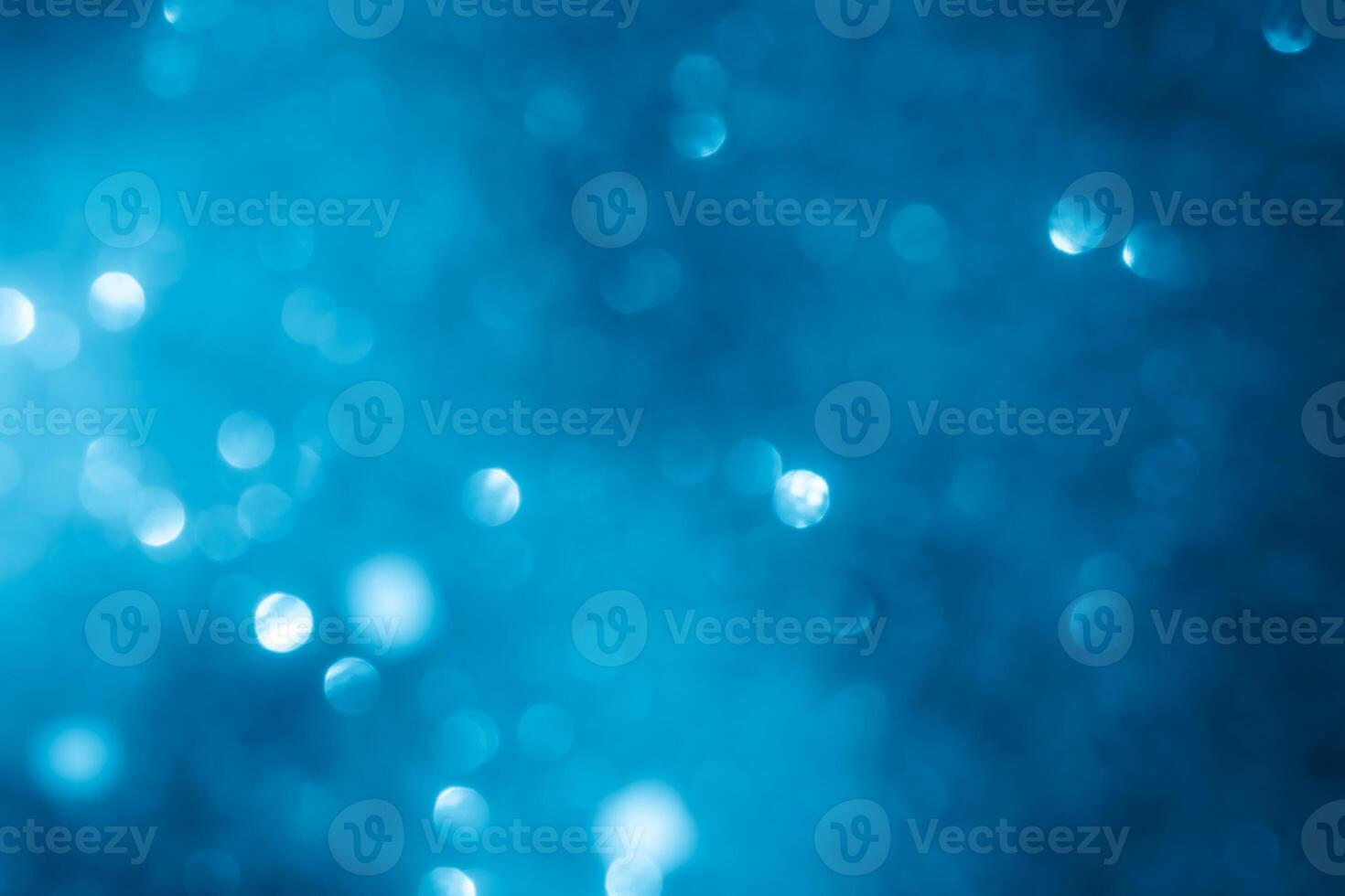 Turquoise lights bokeh background. Blue lights. photo