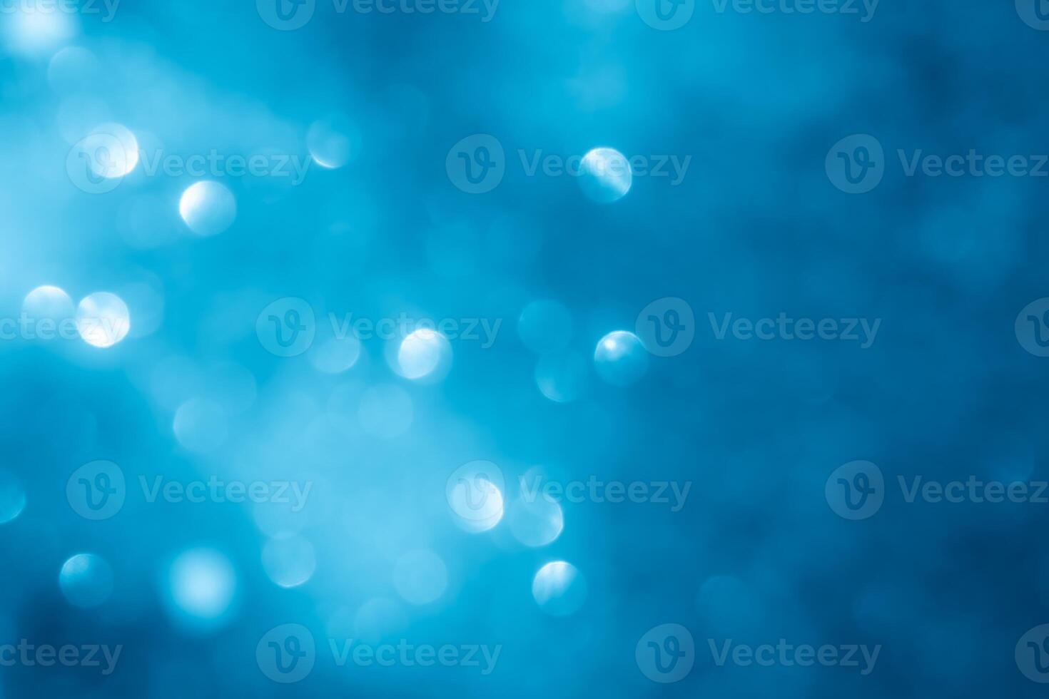 Turquoise lights bokeh background. Blue lights. photo