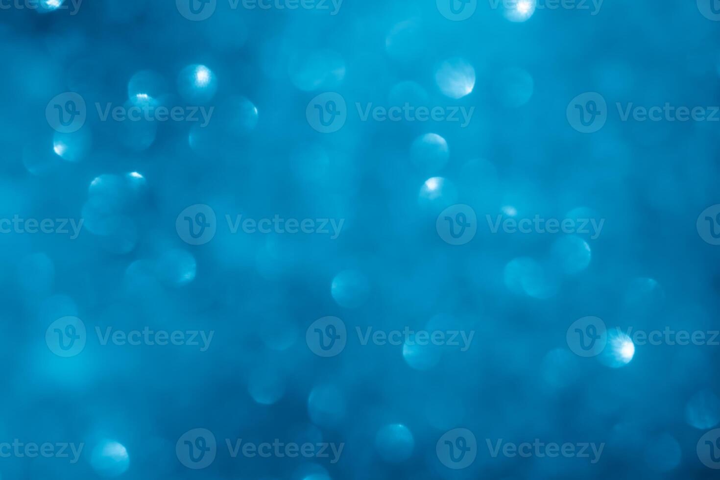 Turquoise lights bokeh background. Blue lights. photo