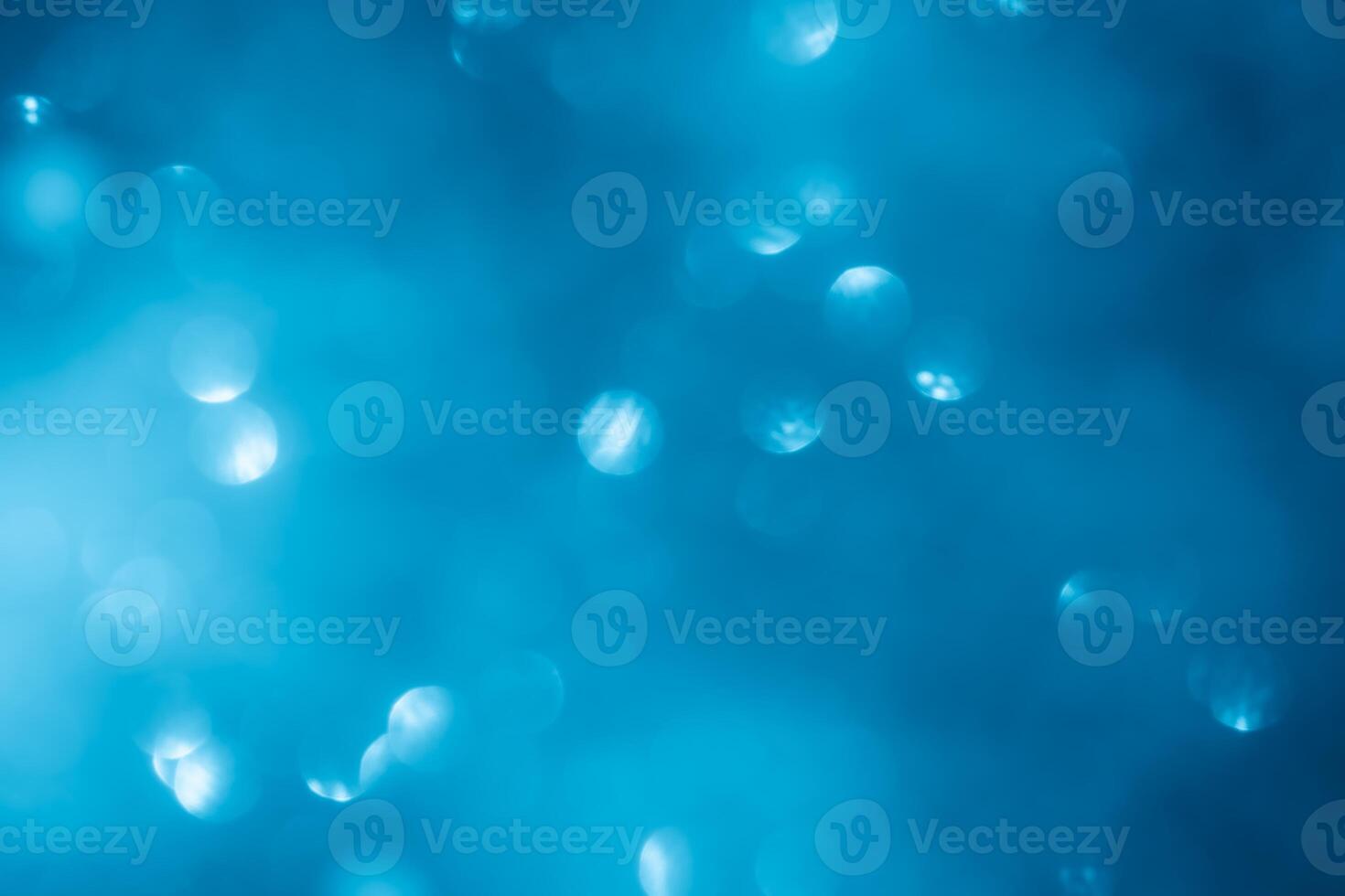Turquoise lights bokeh background. Blue lights. photo