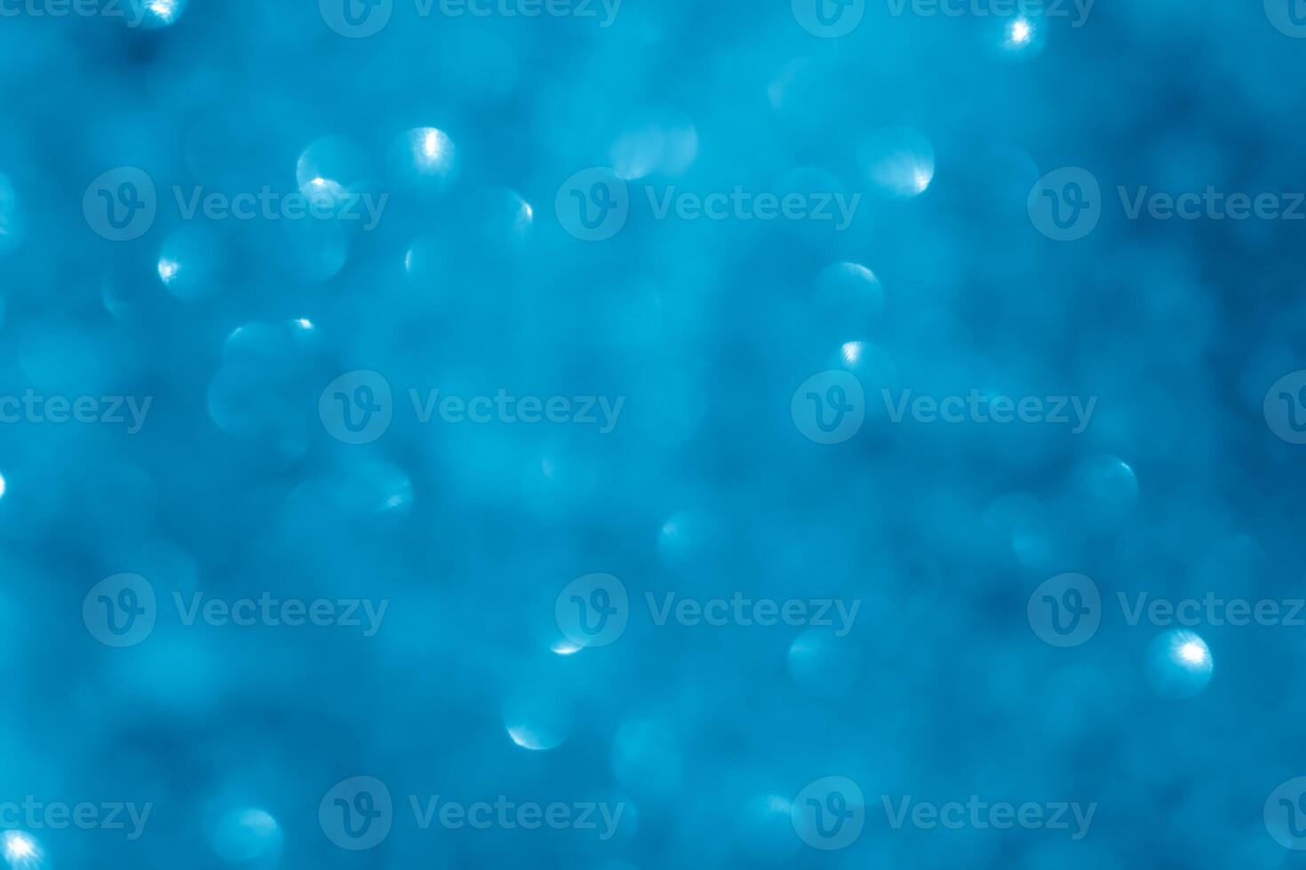 Turquoise lights bokeh background. Blue lights. photo