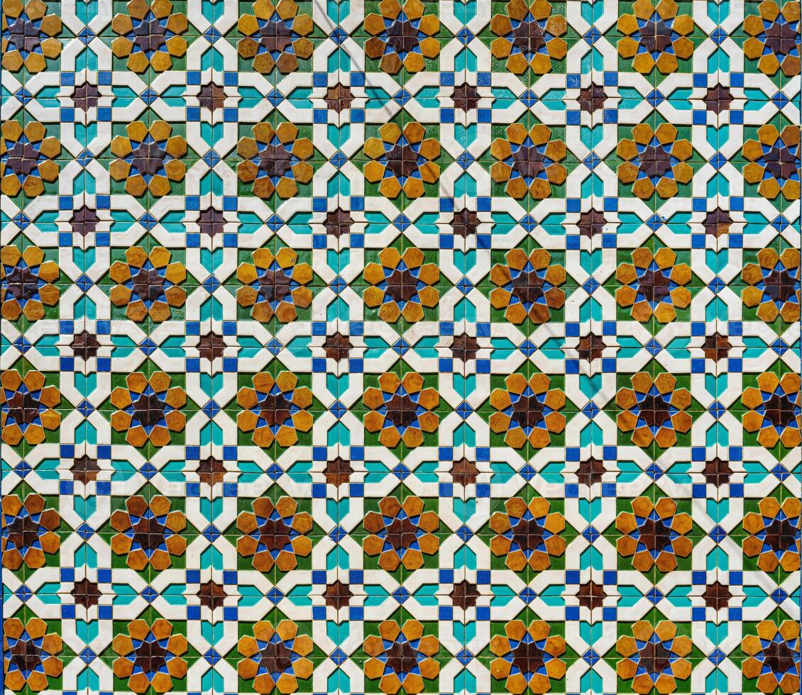 Geometric traditional Islamic ornament. Fragment of a ceramic mosaic. photo