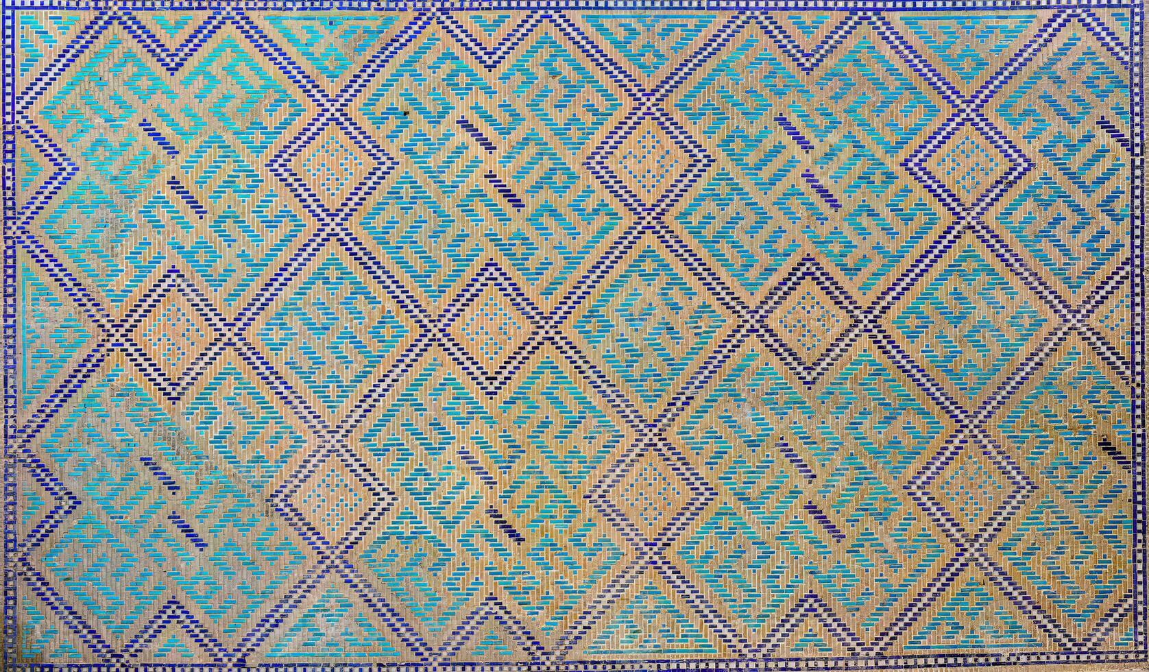 Geometric traditional Islamic ornament. Fragment of a ceramic mosaic. photo