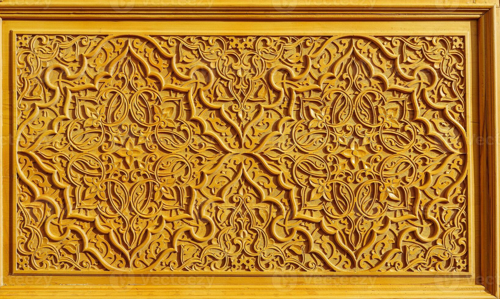 Fragment of a carved wooden door. Ornate. photo