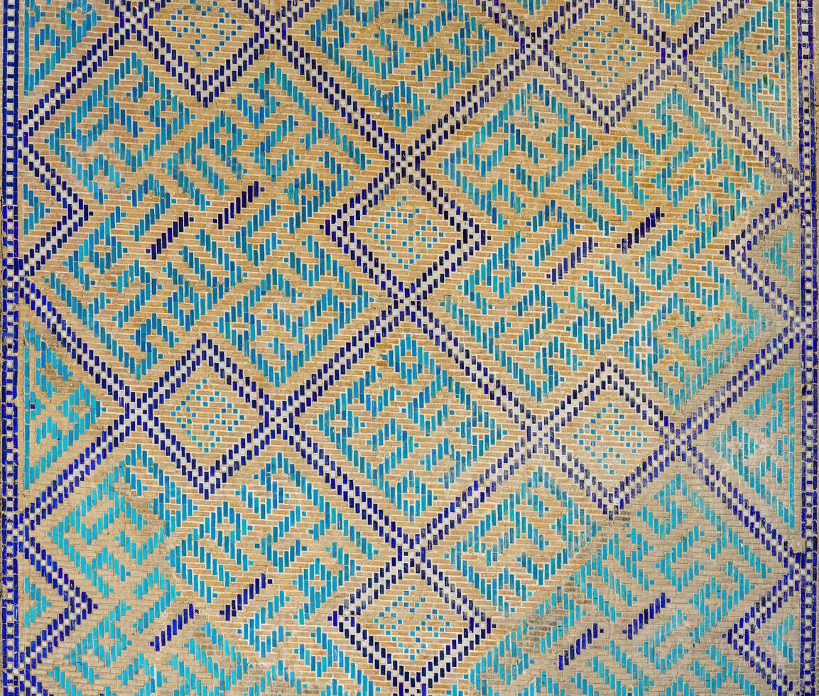 Geometric traditional Islamic ornament. Fragment of a ceramic mosaic. photo