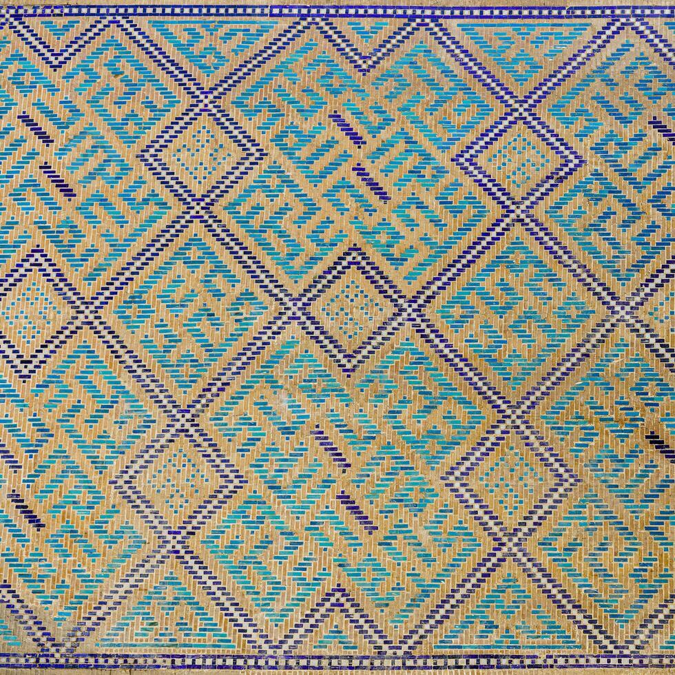 Geometric traditional Islamic ornament. Fragment of a ceramic mosaic. photo