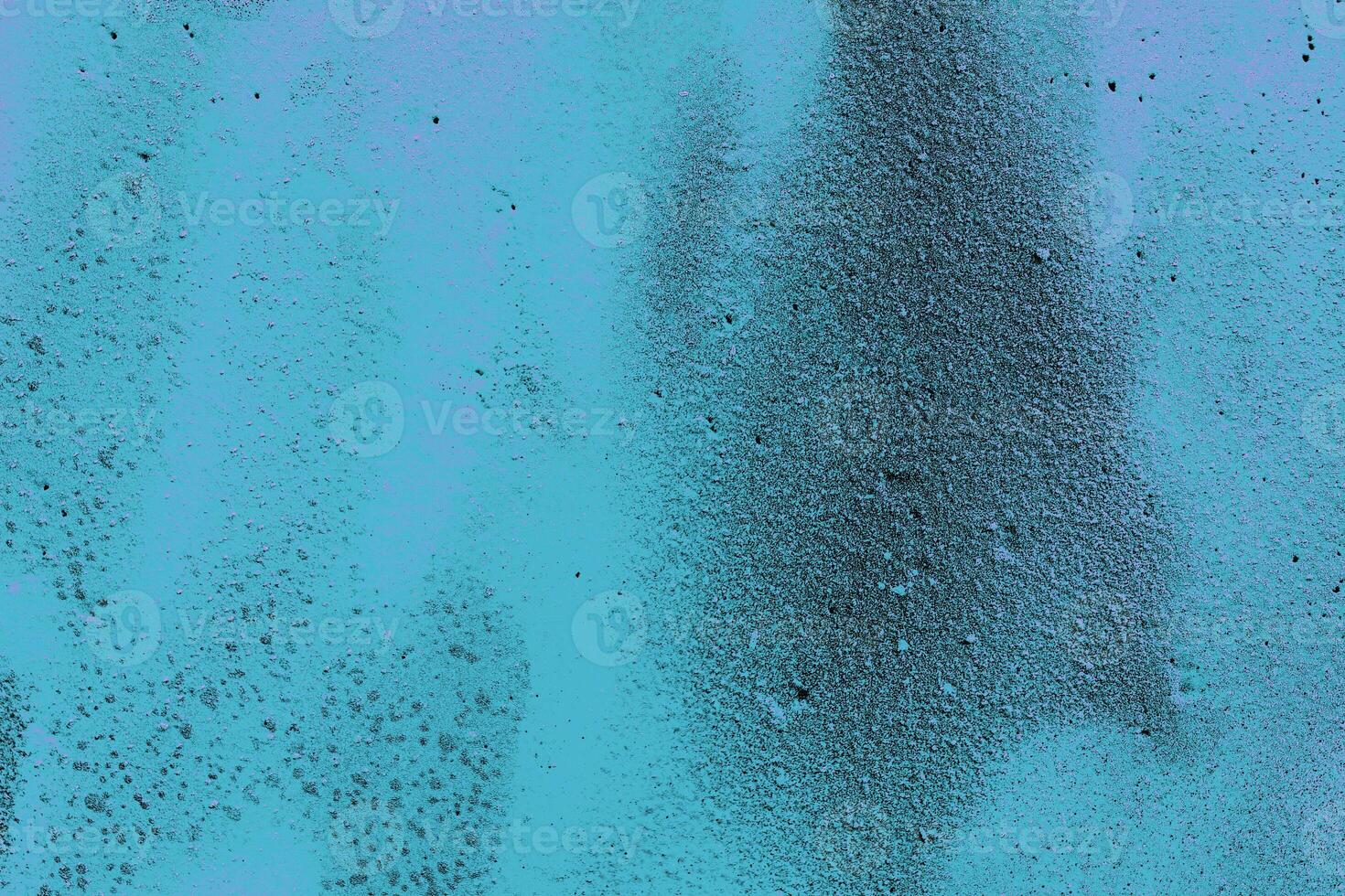 Colorful graffiti painted on a wall. Abstract urban background. Spray painting art. photo