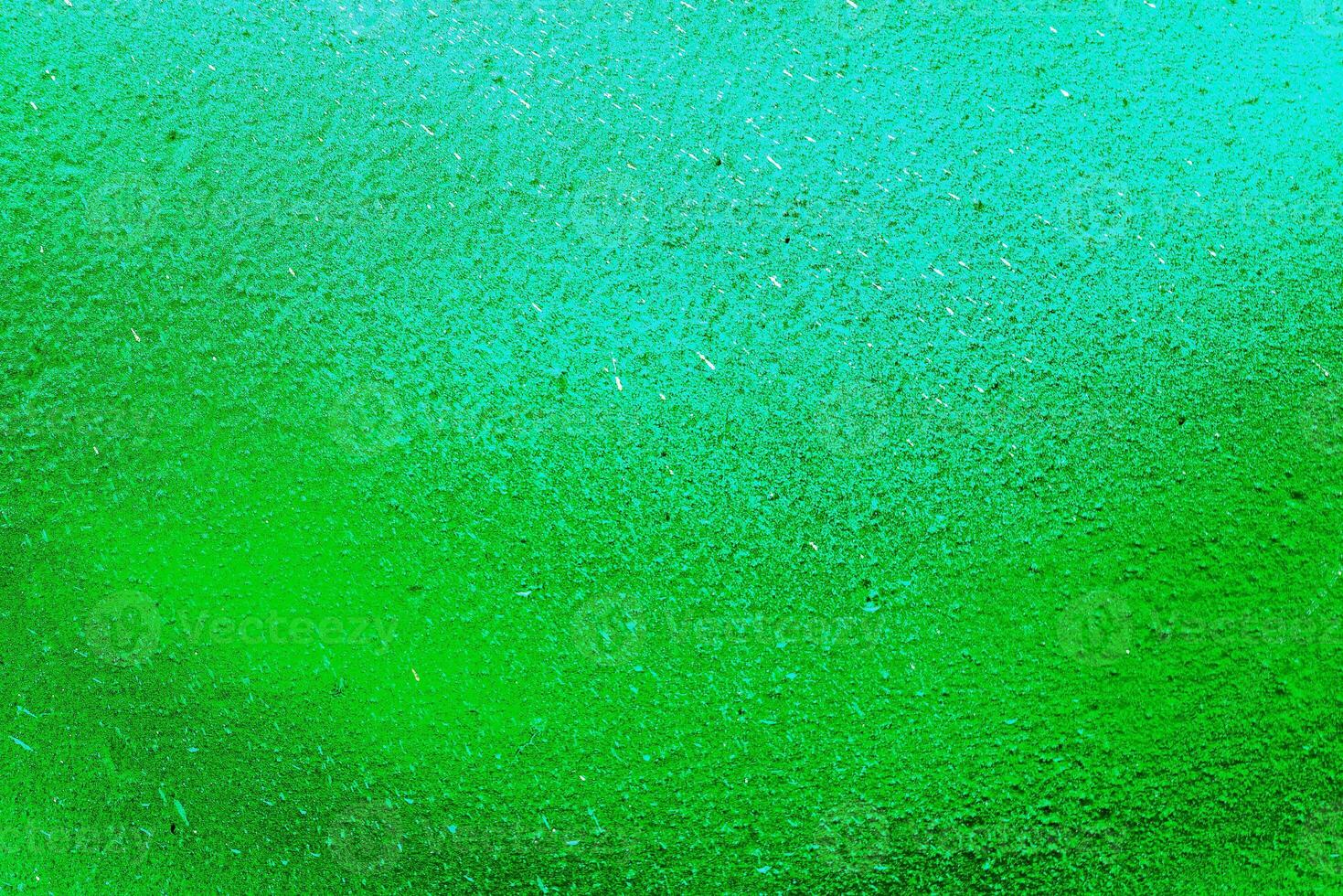 Colorful graffiti painted on a wall. Abstract urban background. Spray painting art. photo