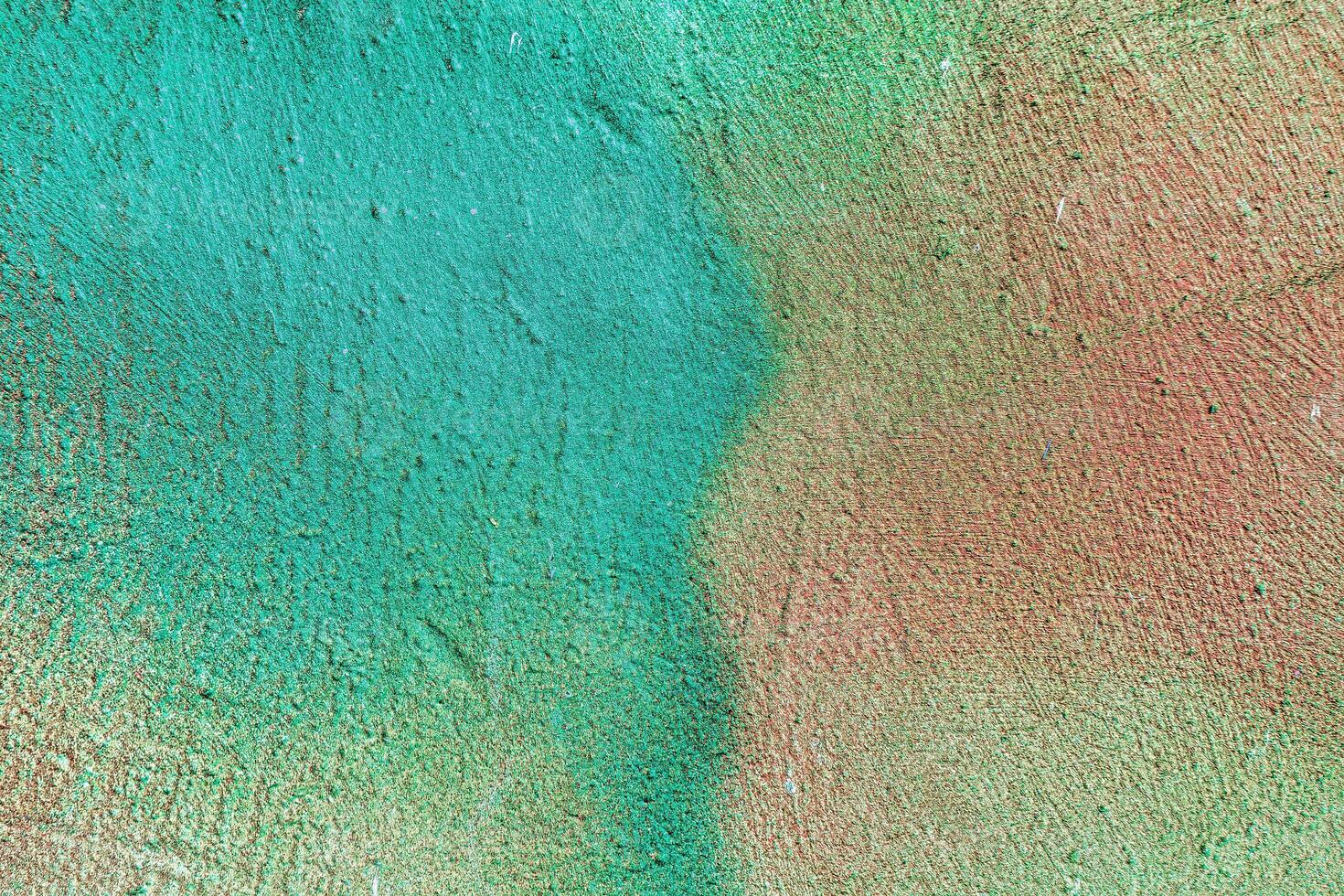 Colorful graffiti painted on a wall. Abstract urban background. Spray painting art. photo