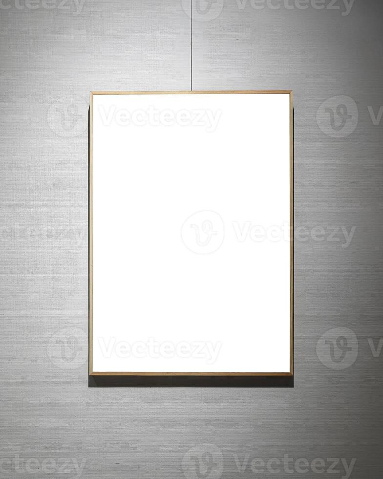 Picture frames with copy space for text hanging on the wall with wallpaper. Mockup for design. photo