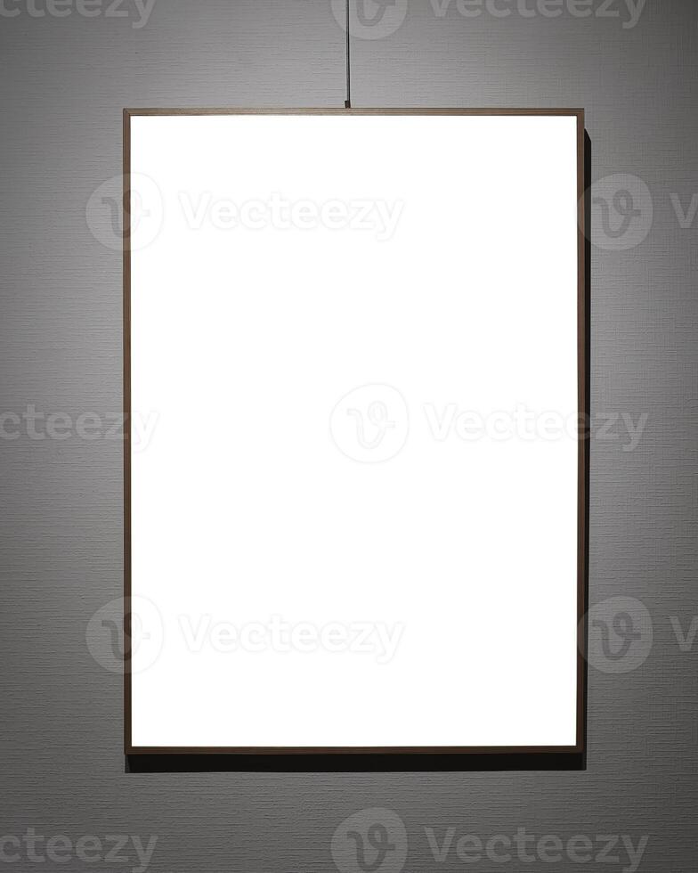 Picture frames with copy space for text hanging on the wall with wallpaper. Mockup for design. photo