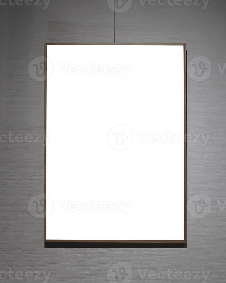 Picture frames with copy space for text hanging on the wall with wallpaper. Mockup for design. photo