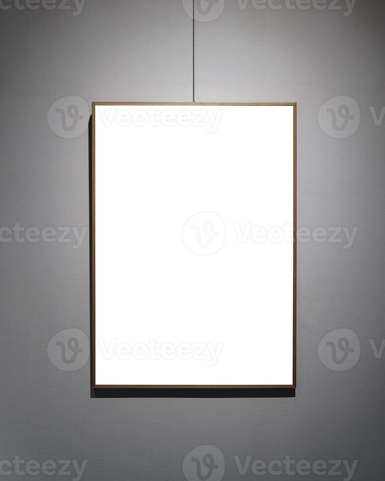 Picture frames with copy space for text hanging on the wall with wallpaper. Mockup for design. photo