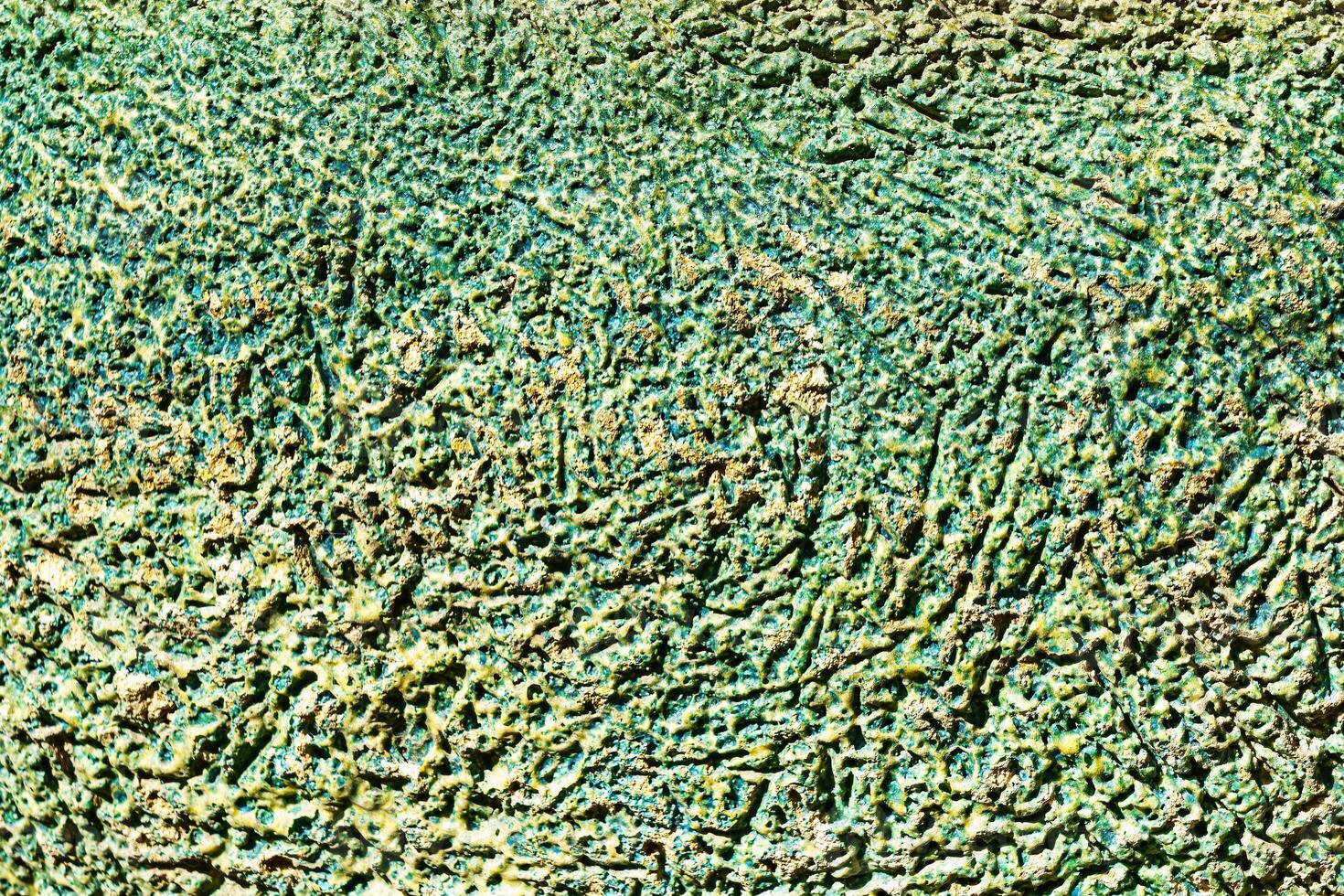 Texture of green scratched concrete. Abstract background. photo