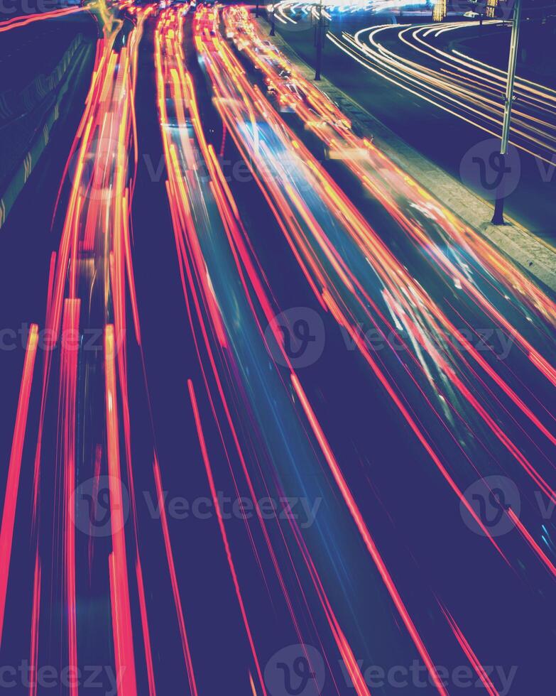 Car traffic light at night city. photo